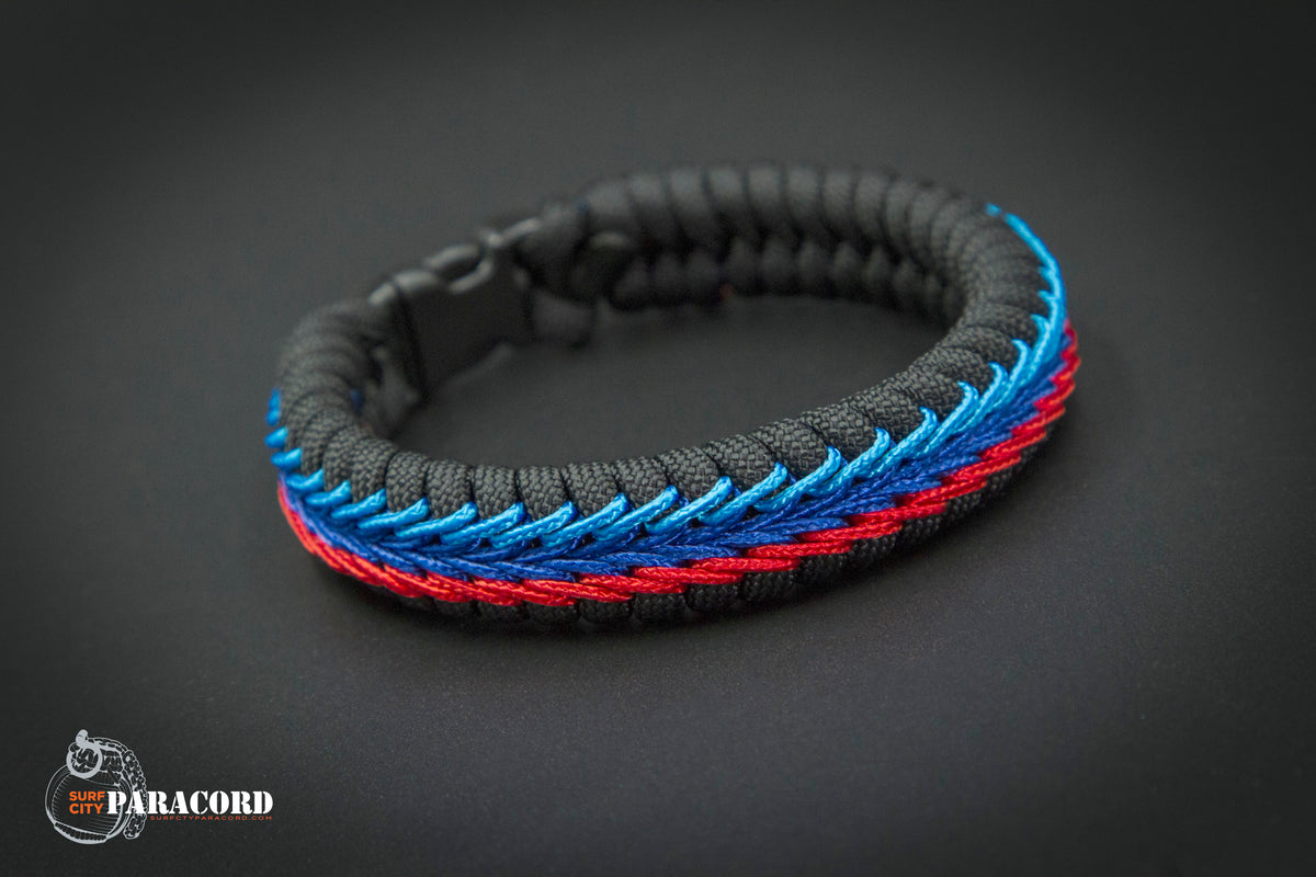Paracord Stitched Fishtail Bracelet. (Black with M Stripes)