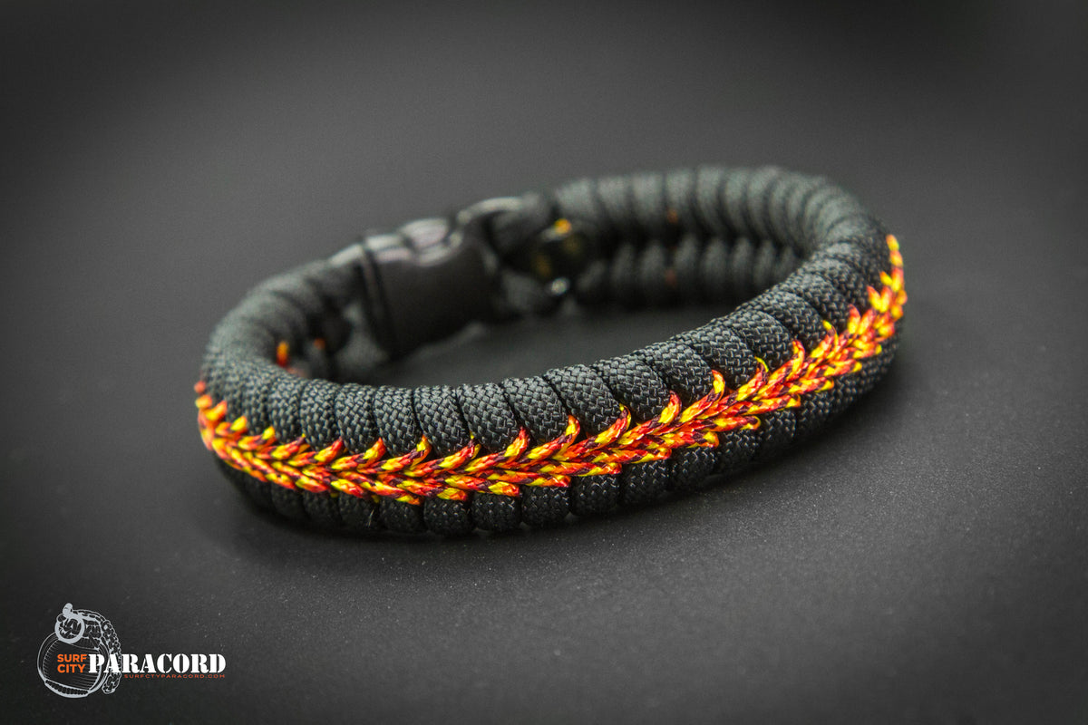 Black Paracord Fishtail Bracelet with Fireball Center Stitch. 5.25