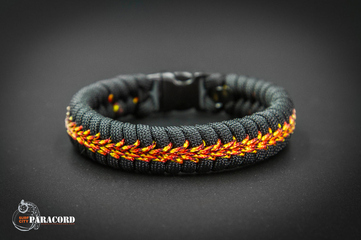 Black Paracord Fishtail Bracelet with Fireball Center Stitch. 5.25
